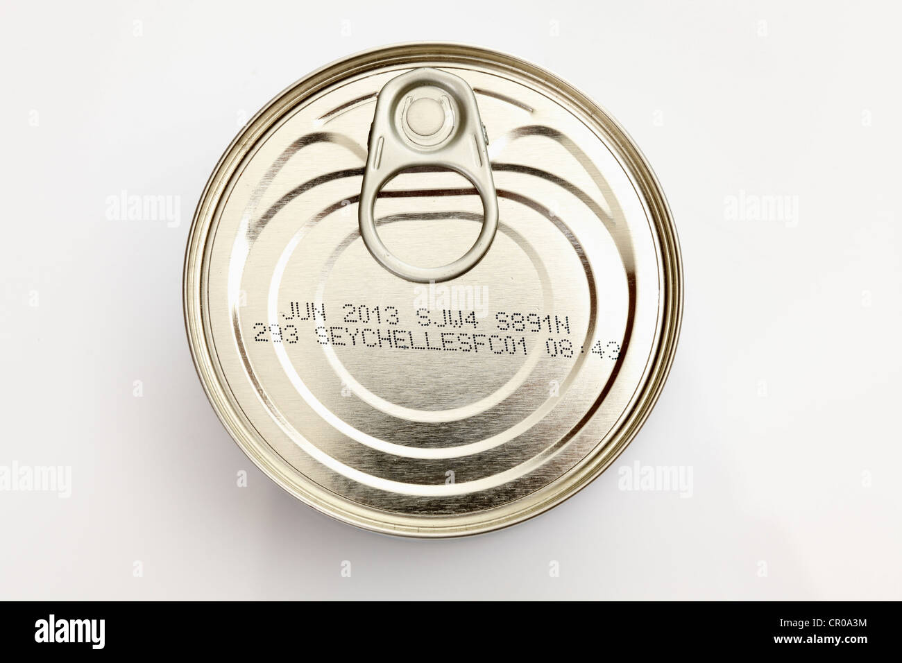 Tin with origin note and expiration date Stock Photo Alamy