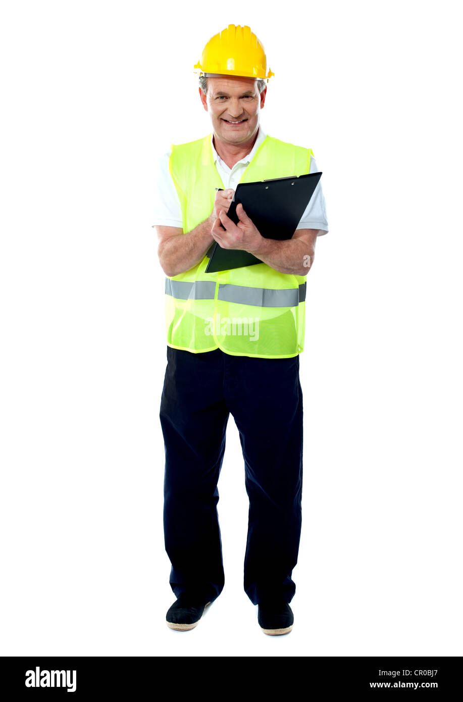 Full length portrait of an old age architect holding documents and writing something Stock Photo