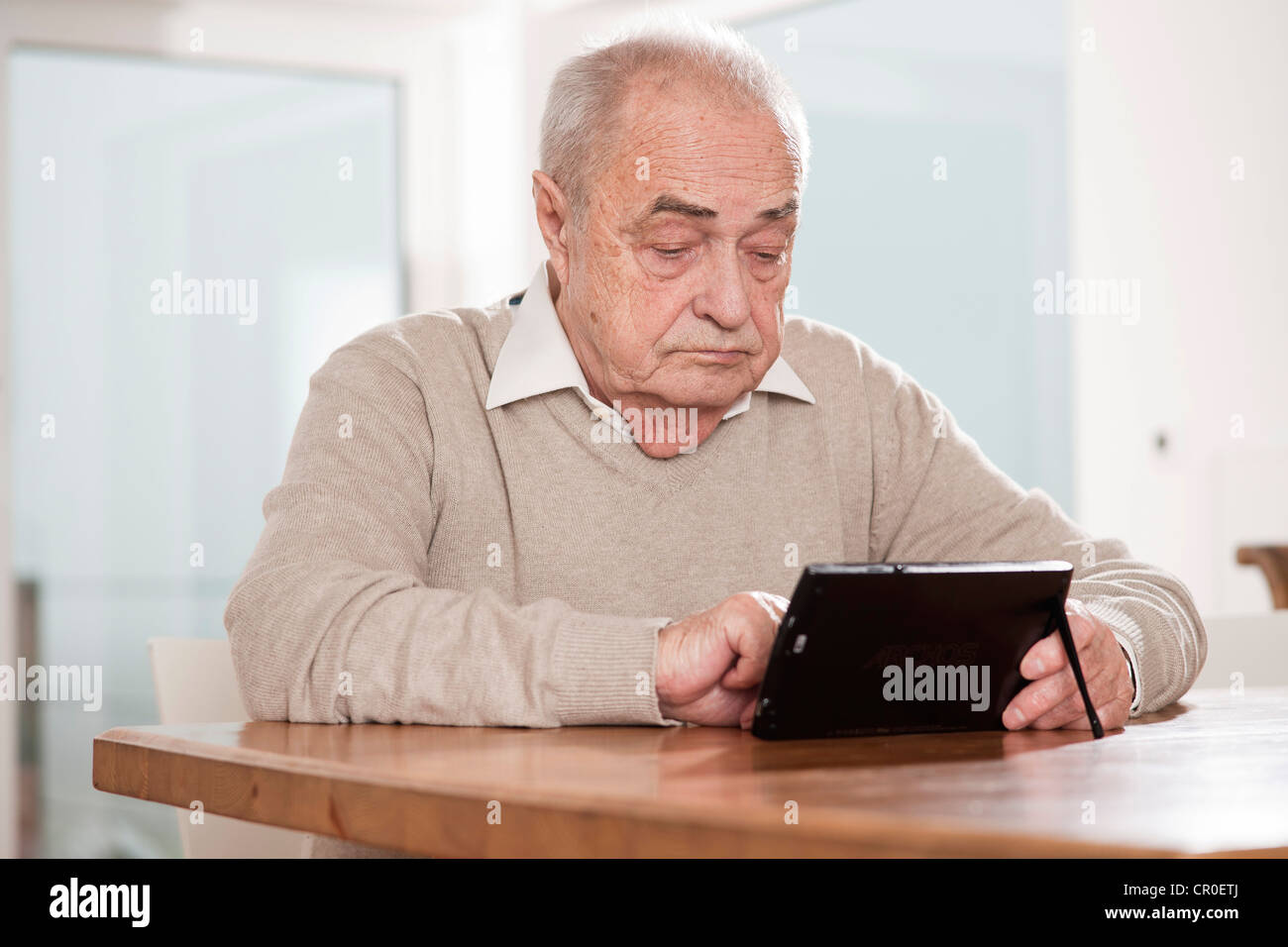 Pensioner old man netbook hi-res stock photography and images - Alamy