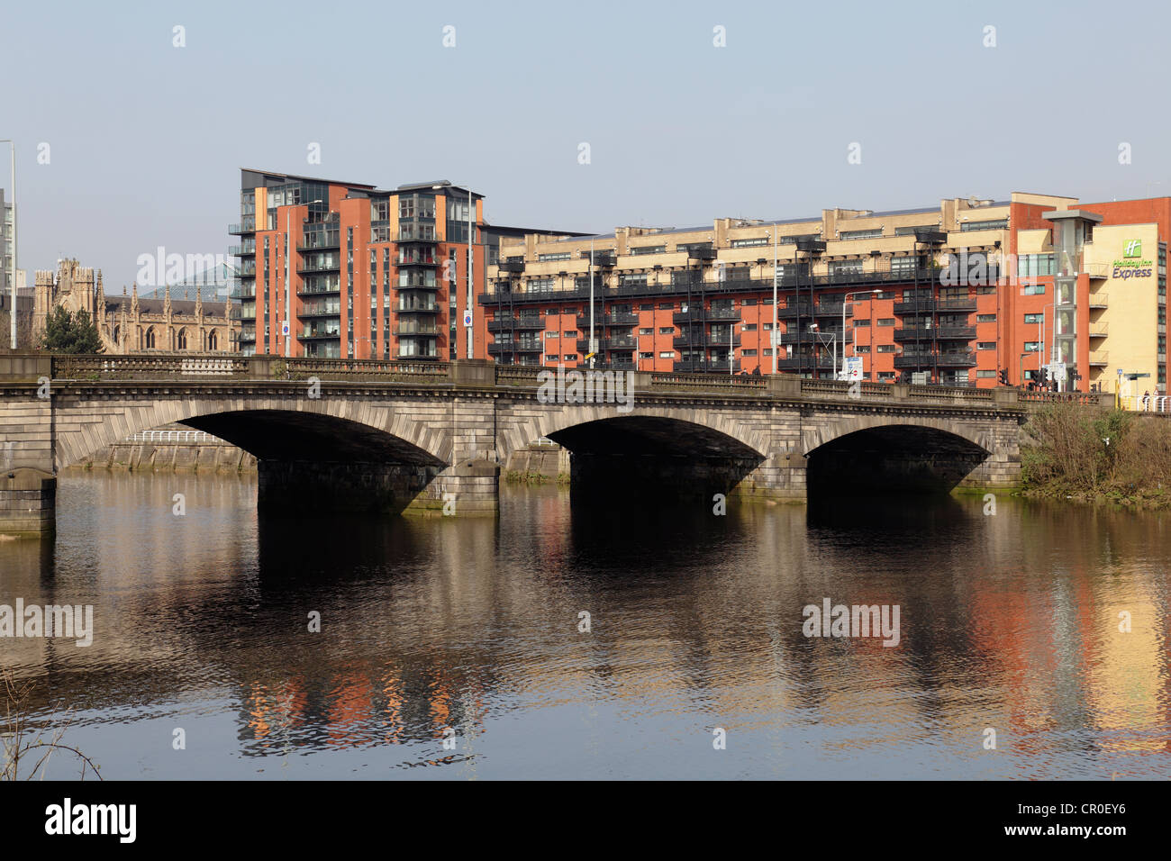 Looking north across the River Clyde to Victoria Bridge, opened in 1854, and modern apartments on Clyde Street, Glasgow, Scotland, UK Stock Photo