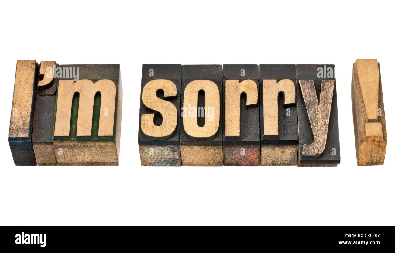I am sorry - isolated phrase in vintage letterpress wood type Stock Photo