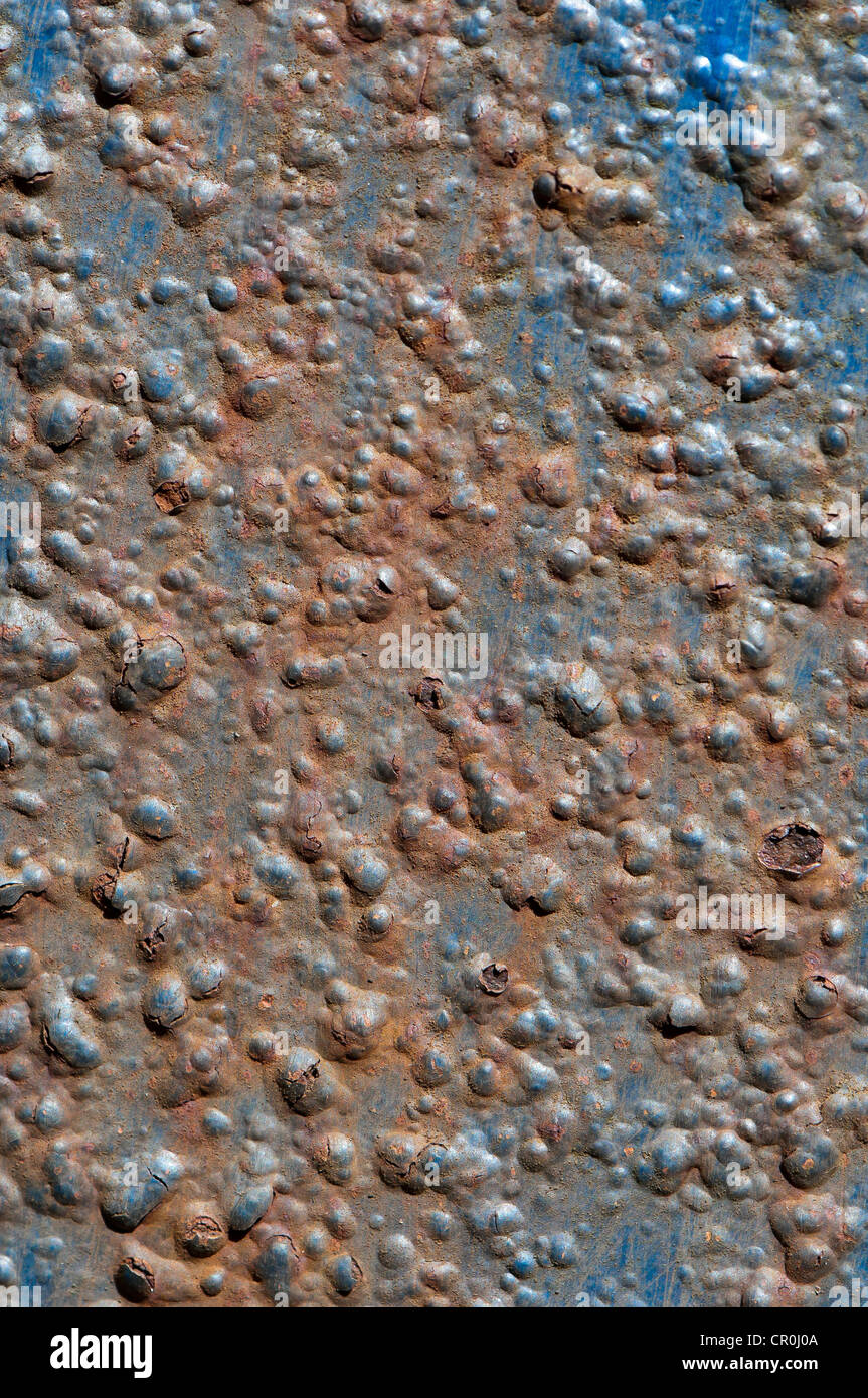 Blue-painted metal surface with rust, background Stock Photo