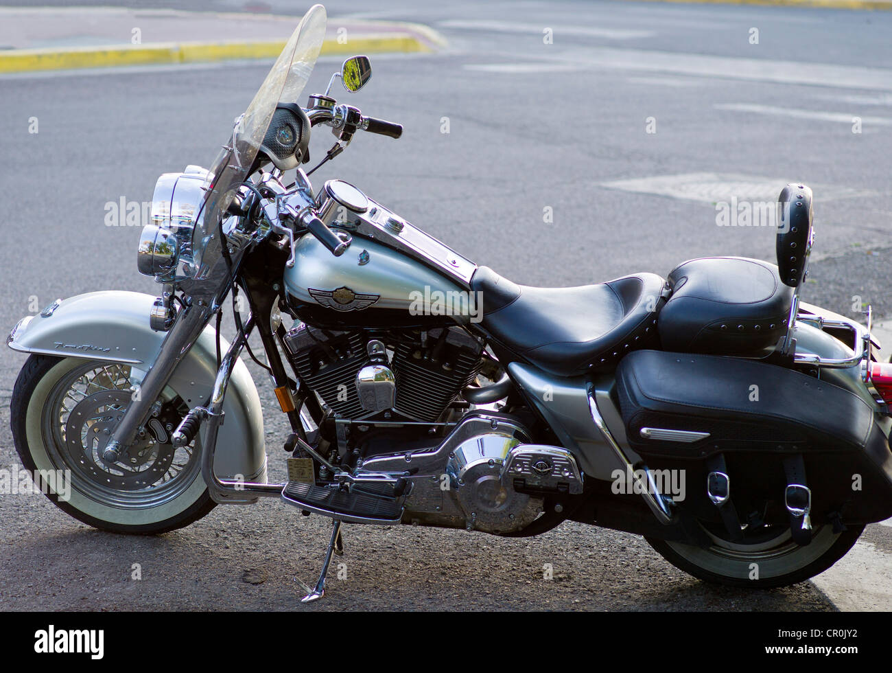 Old Harley Davidson motorcycle parked in the historic downtown district, small mountain town of Salida, Colorado, USA Stock Photo