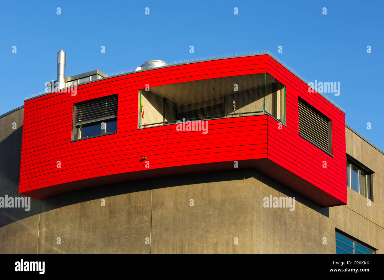 Facade, corner apartment with balcony and red wood paneling, College Sismondi, Geneva, Switzerland, Europe Stock Photo