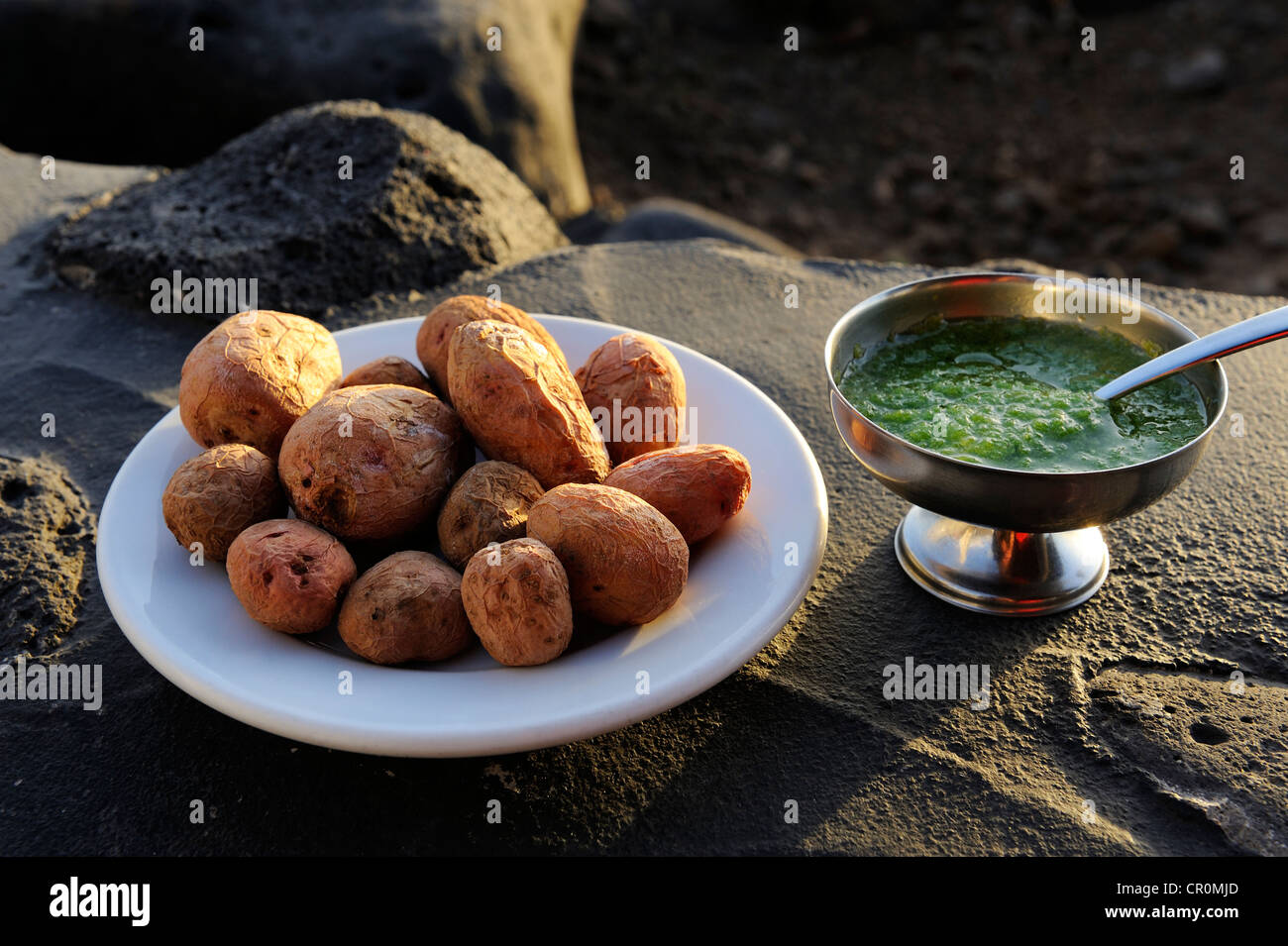 Traditional Canarian wrinkly potatoes, papas arrugadas with mojo verde, tapas, La Palma, Canary Islands, Spain, Europe Stock Photo