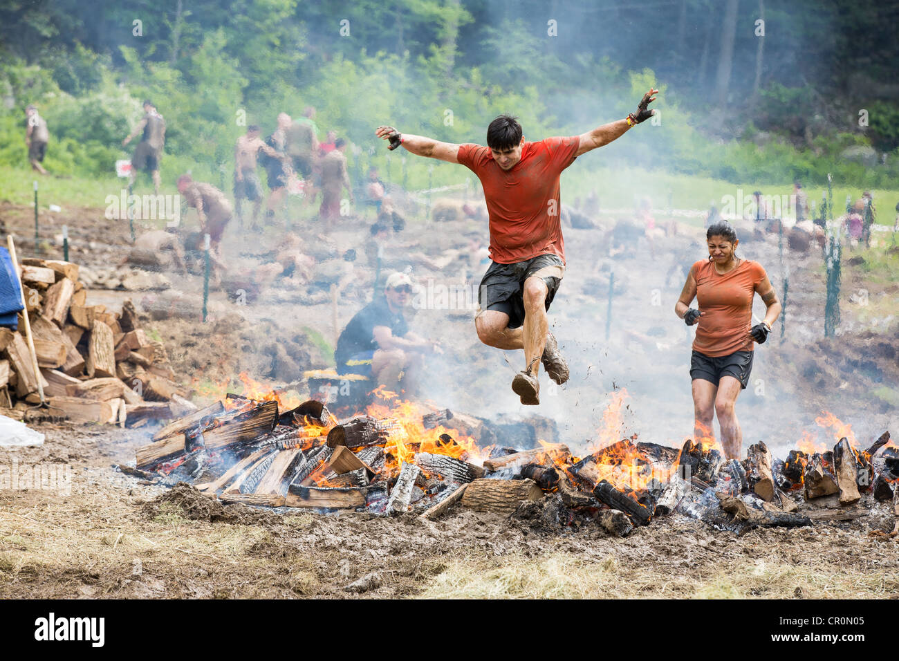 Participants of challenging sprint obstacle trail race, Spartan Race in Tuxedo New York, running