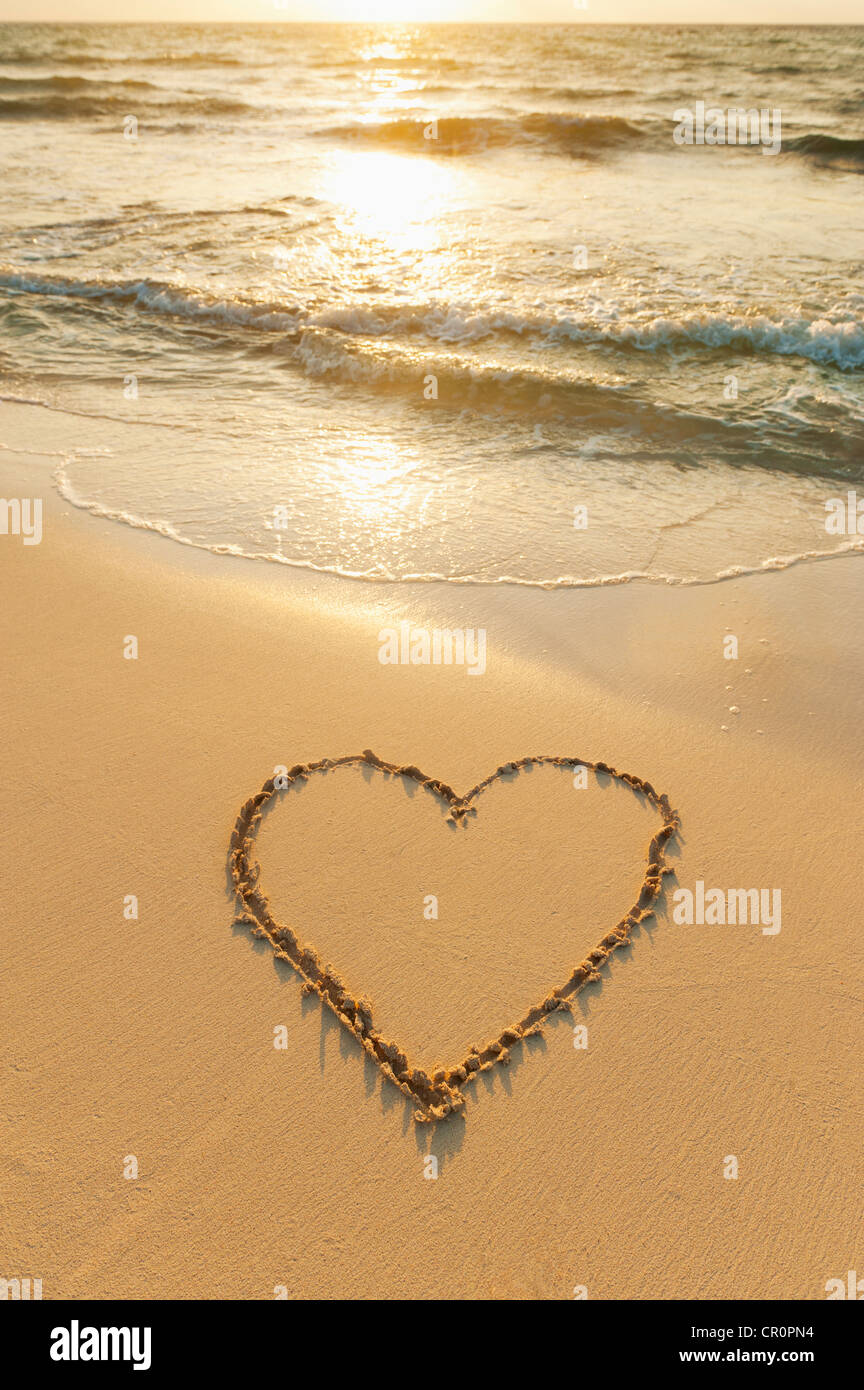 Mexico, Yucatan, Heart drawn in sand on beach Stock Photo