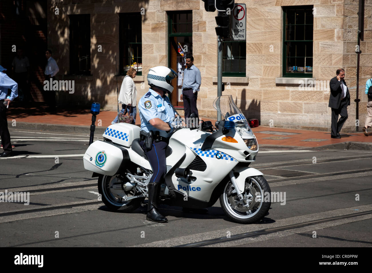 Police motorbike preparing the route for a protest march. Police motorcylcle; NSW police officer; BMW motorcycle; Australian police man; Australia Stock Photo