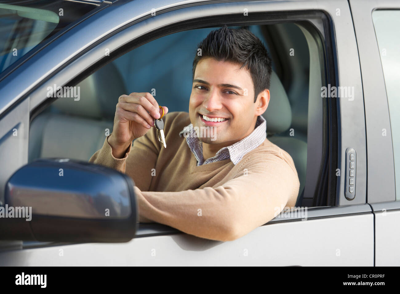 USA, New Jersey, Jersey City, Man sitting in his new car Stock Photo
