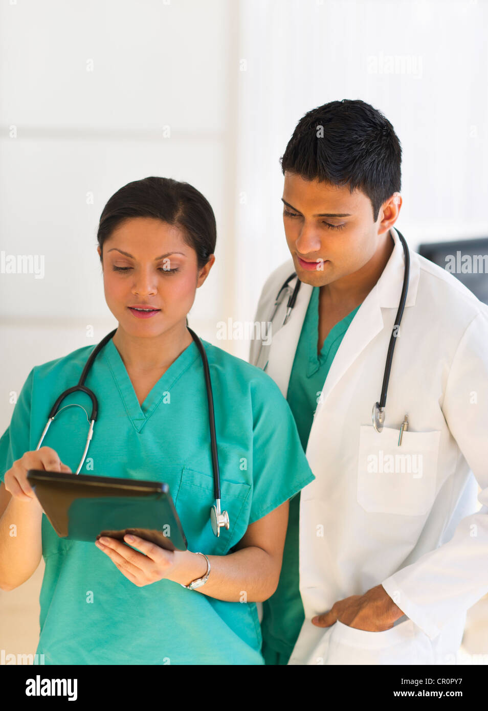 USA, New Jersey, Jersey City, Doctors using digital tablet Stock Photo