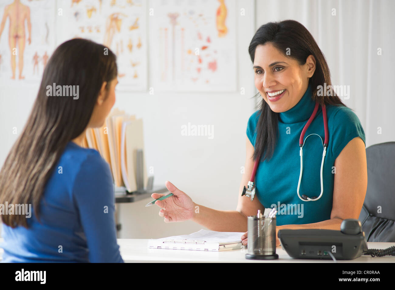 USA, New Jersey, Jersey City, Doctor and patient (1213) in doctor's