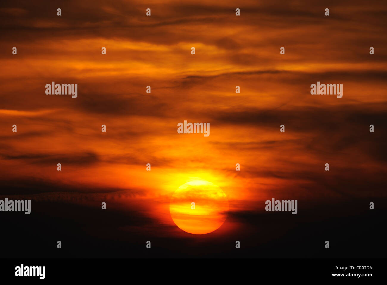 Sunset with clouds Stock Photo - Alamy
