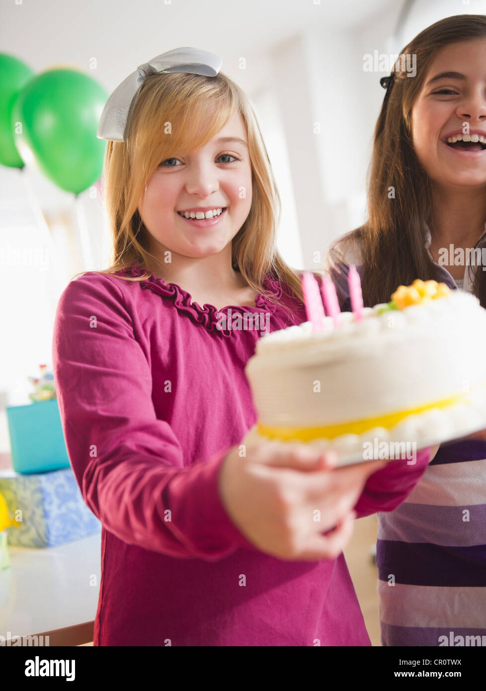 USA, New Jersey, Jersey City, Two girls celebrating birthday Stock ...
