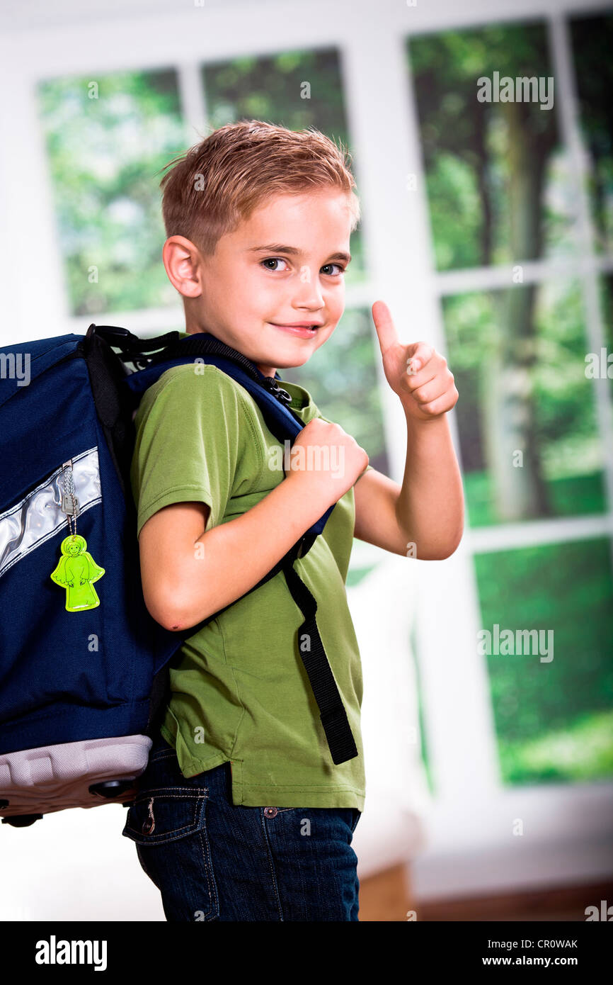 A first grader school boy with school bag Stock Photo