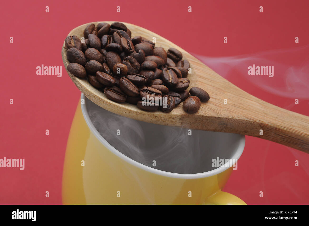 Coffee beans with steam, freshly roasted coffee Stock Photo Alamy
