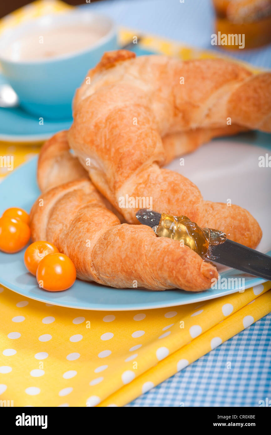 Breakfast table with croissants Stock Photo
