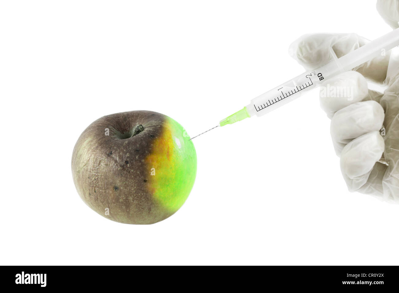abstract of skin renovation with apple and syringe Stock Photo