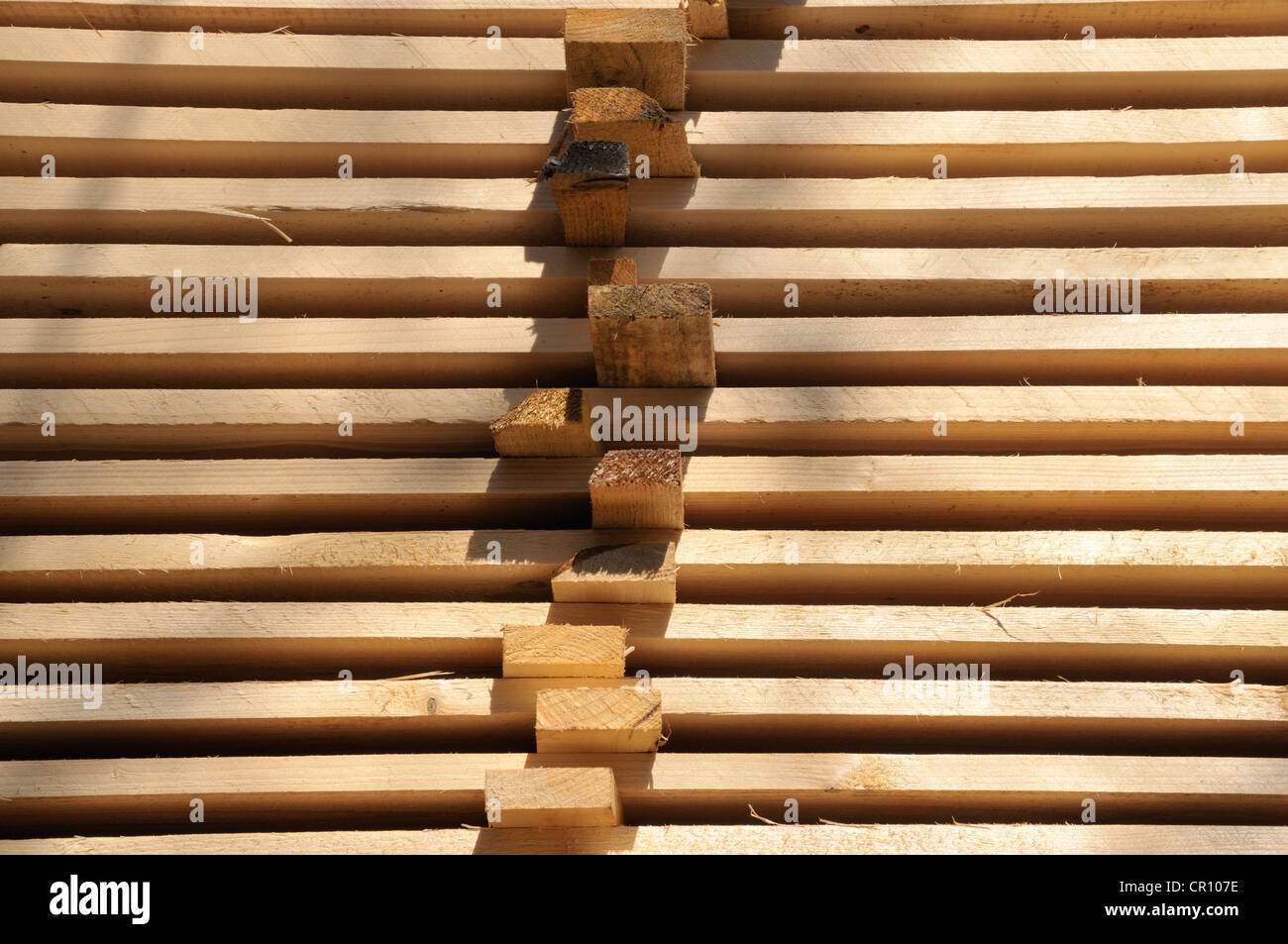 Stacked boards in a lumber mill Stock Photo Alamy