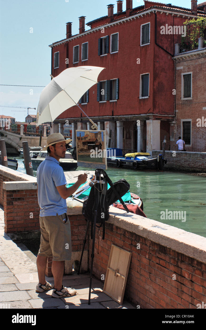 Painter in Venice, Italy Stock Photo