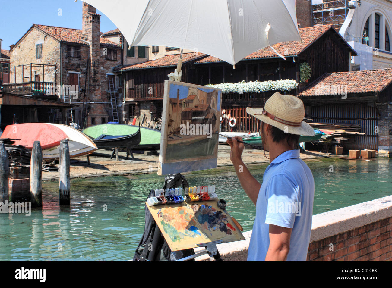Artist painting en plein air, Venice, Italy Stock Photo