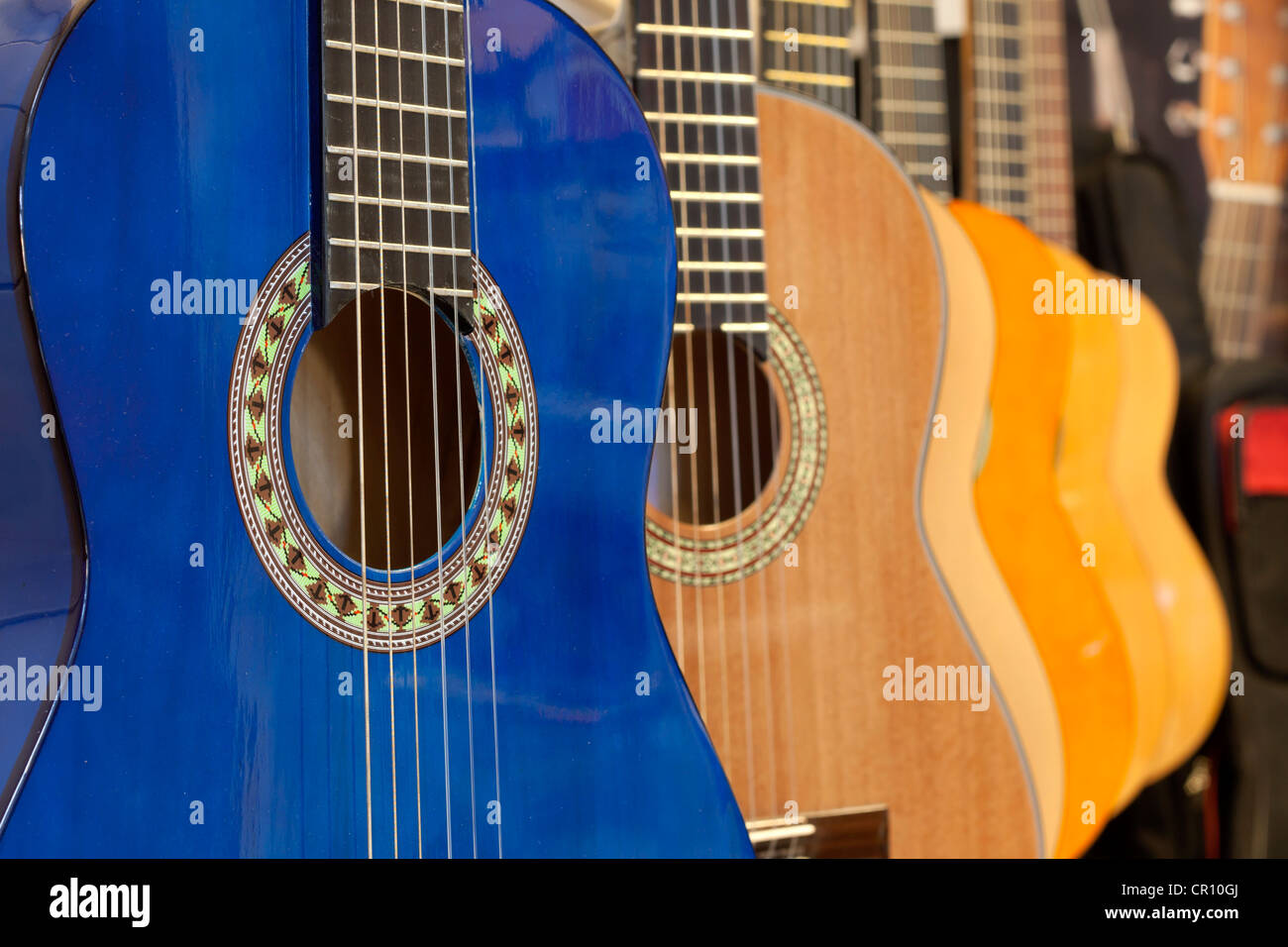 guitars in the store abstract background blur Stock Photo