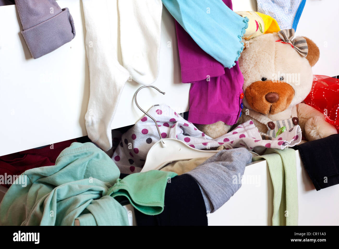 Messy Child Room With Cloth In The Drawer Stock Photo