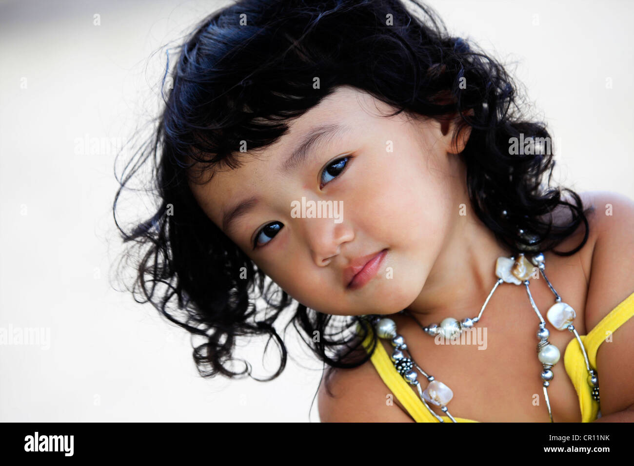 Portrait of the beautiful small Asian girl. Indonesia. Java Stock Photo ...
