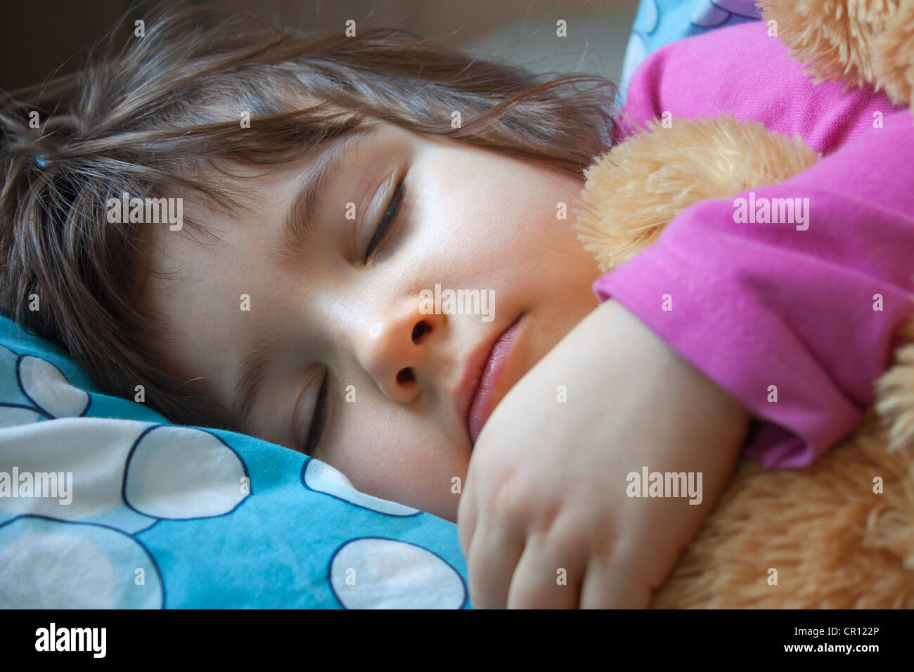 Sleeping child with teddy bear Stock Photo Alamy