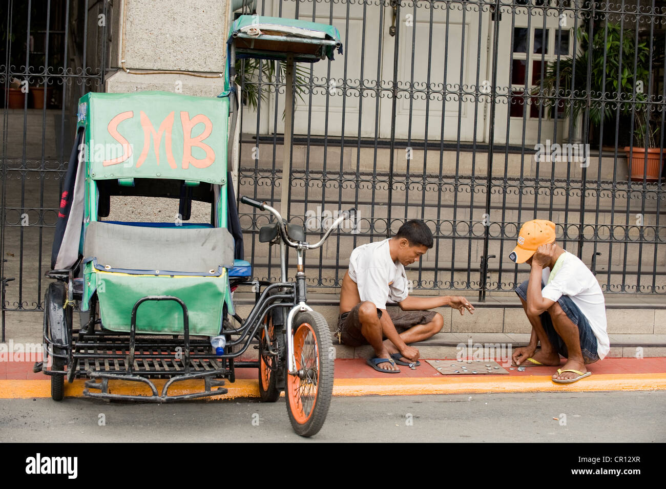Philippines, Luzon Island, Manila, historical district of Intramuros, tricycle drivers Stock Photo