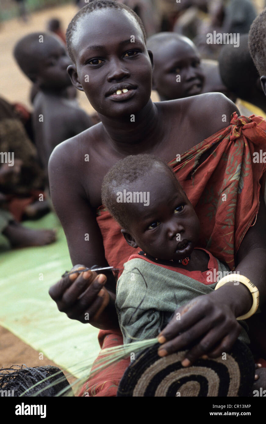 A Dinka mother & child displaced by the war in South Sudan. Atepi , triple A camp Stock Photo