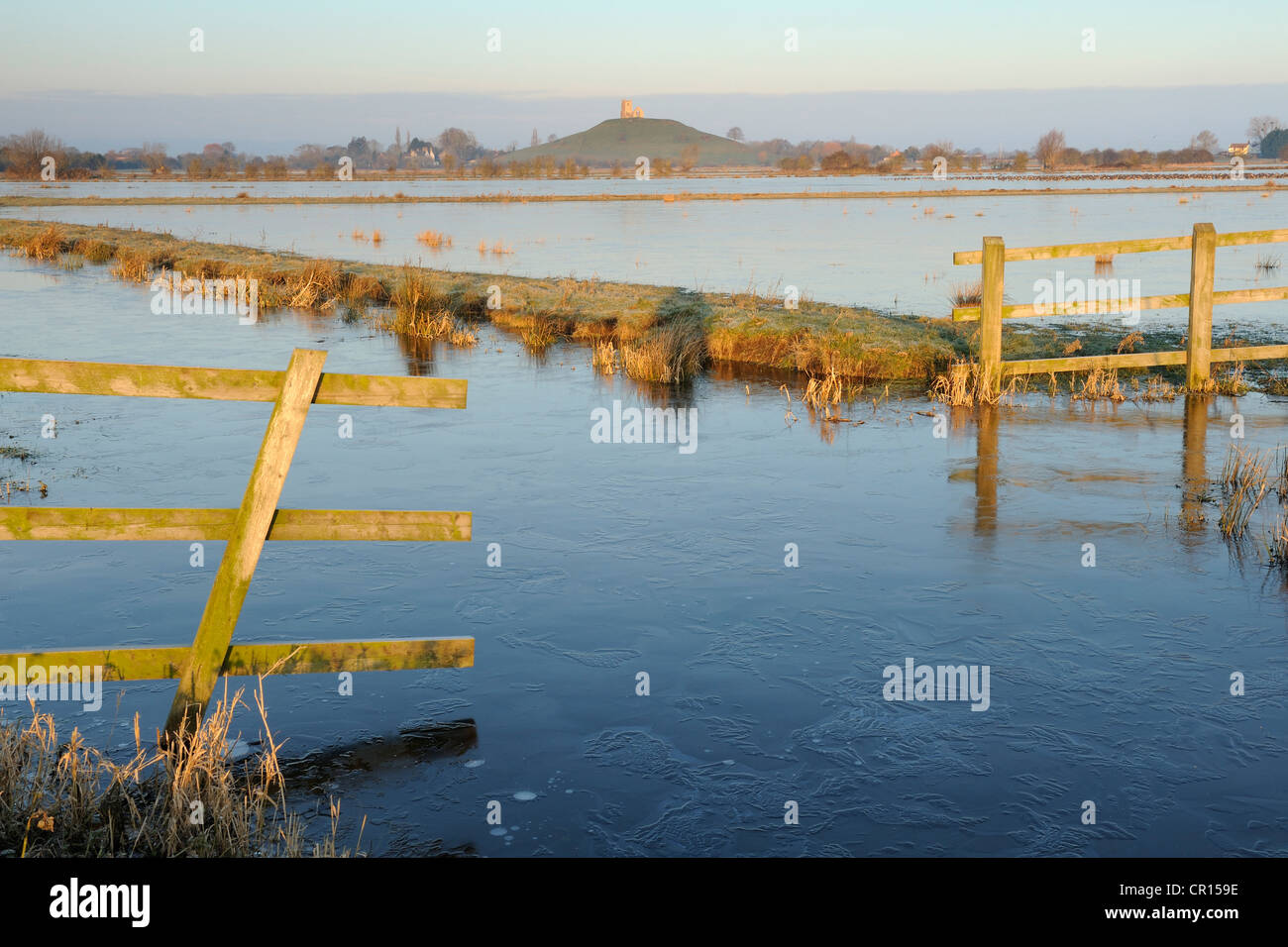 Flooded fields with Burrow Mump in the distance. Burrowbridge, Somerset Levels, UK. Stock Photo