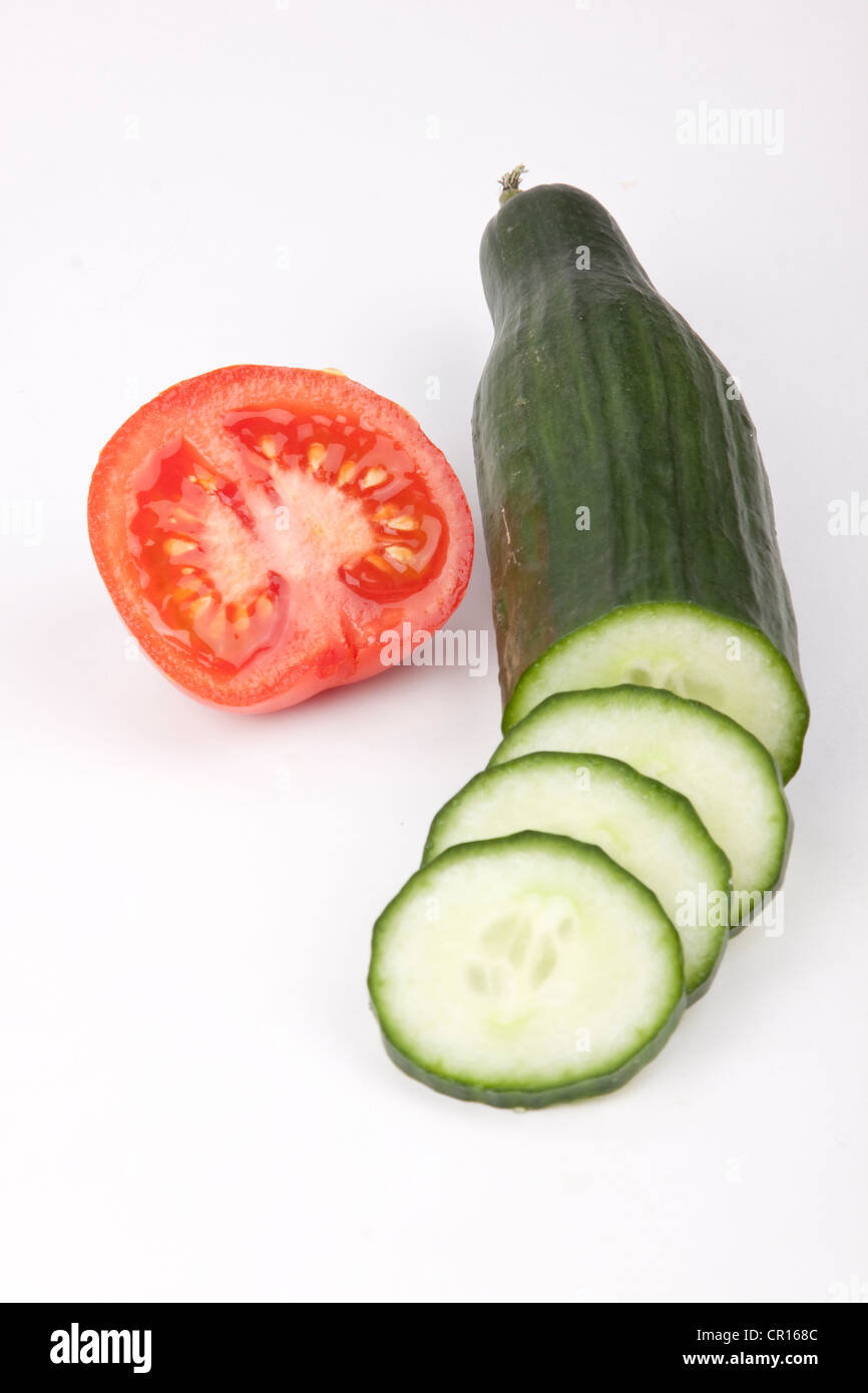 Cucumber and cucumber slices, tomato Stock Photo - Alamy