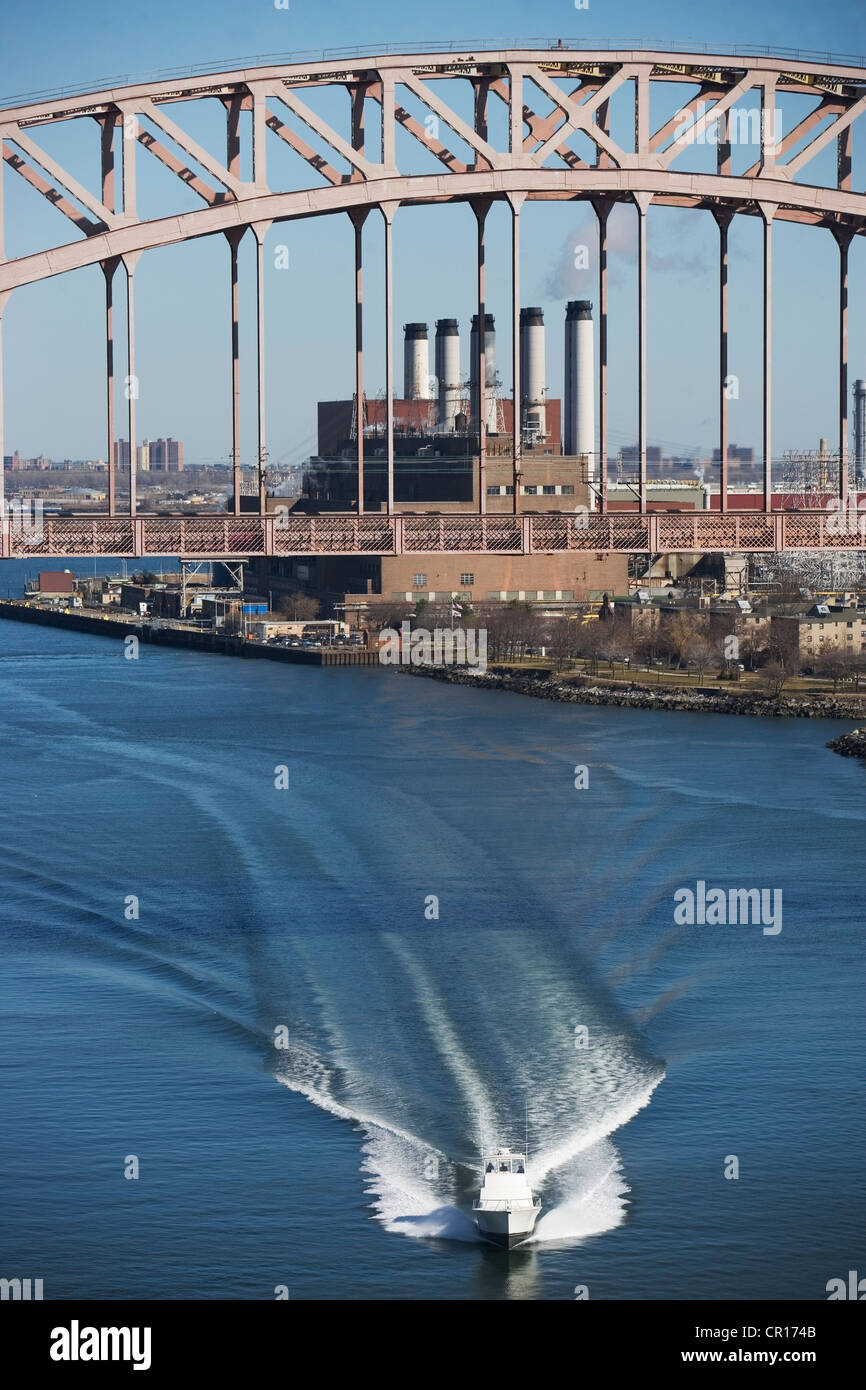 USA, New York, New York City, Ship under bridge Stock Photo