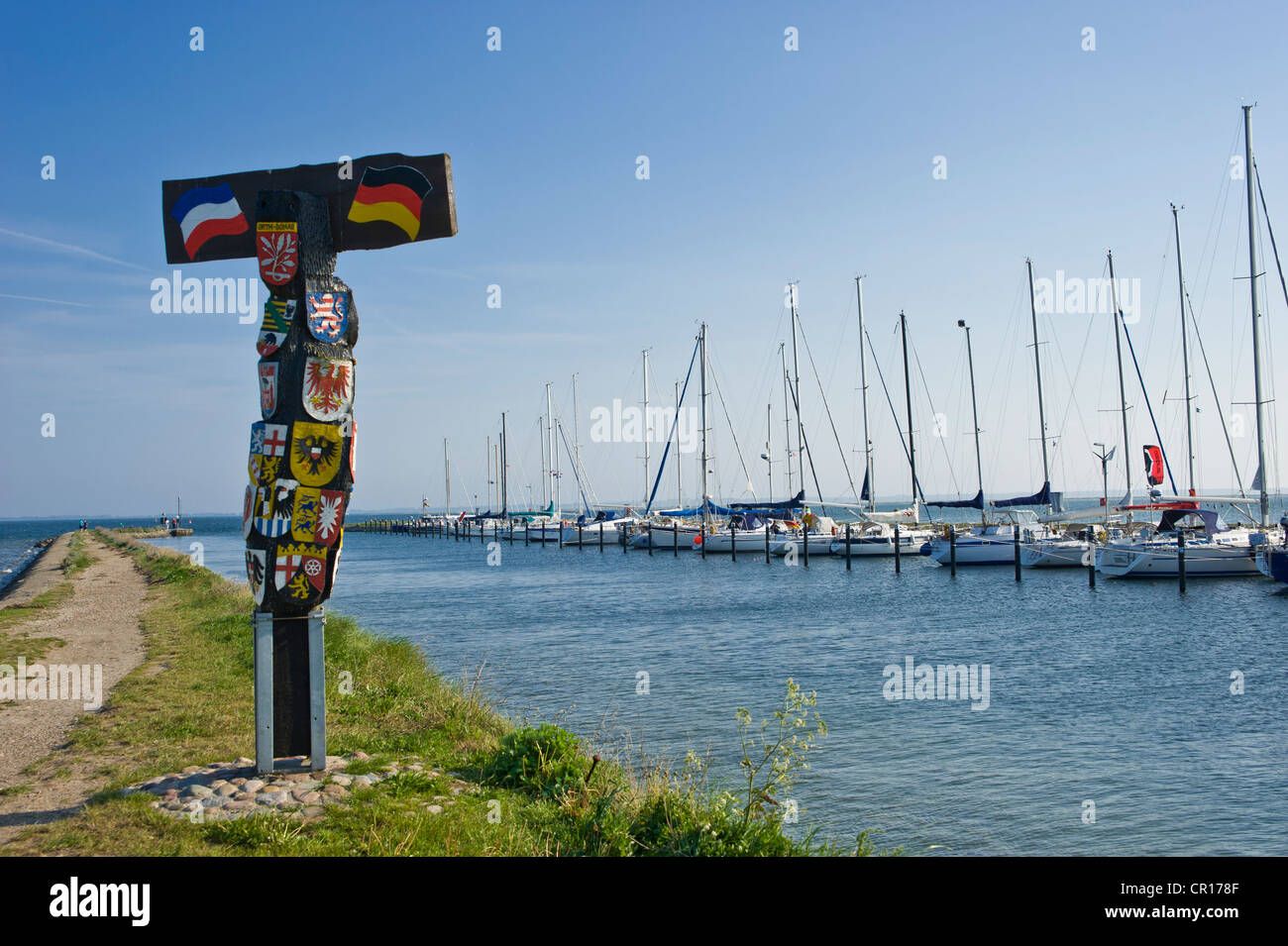 Countries' coat of arms in the harbour of Orth, Island of Fehmarn, Baltic Sea, Schleswig-Holstein, Germany, Europe Stock Photo