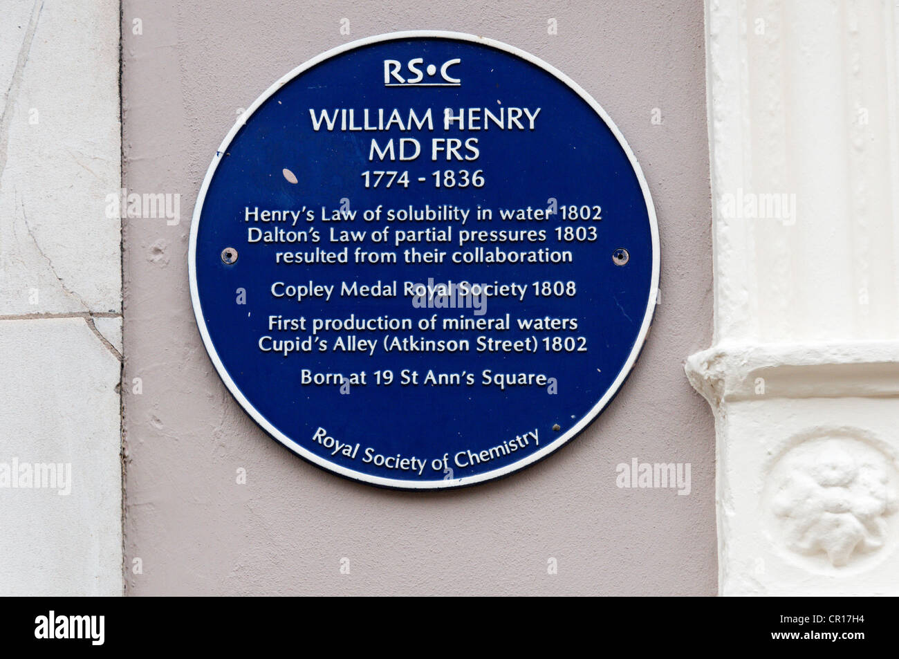 A blue plaque in St Ann's Square, Manchester, marks the birthplace of William Henry the Victorian chemist. Stock Photo