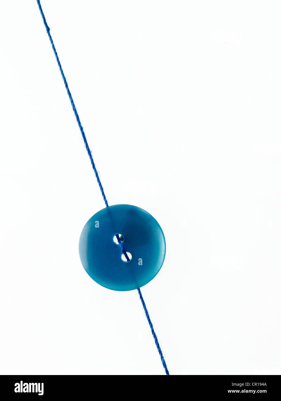 Button thread Cut Out Stock Images & Pictures - Alamy