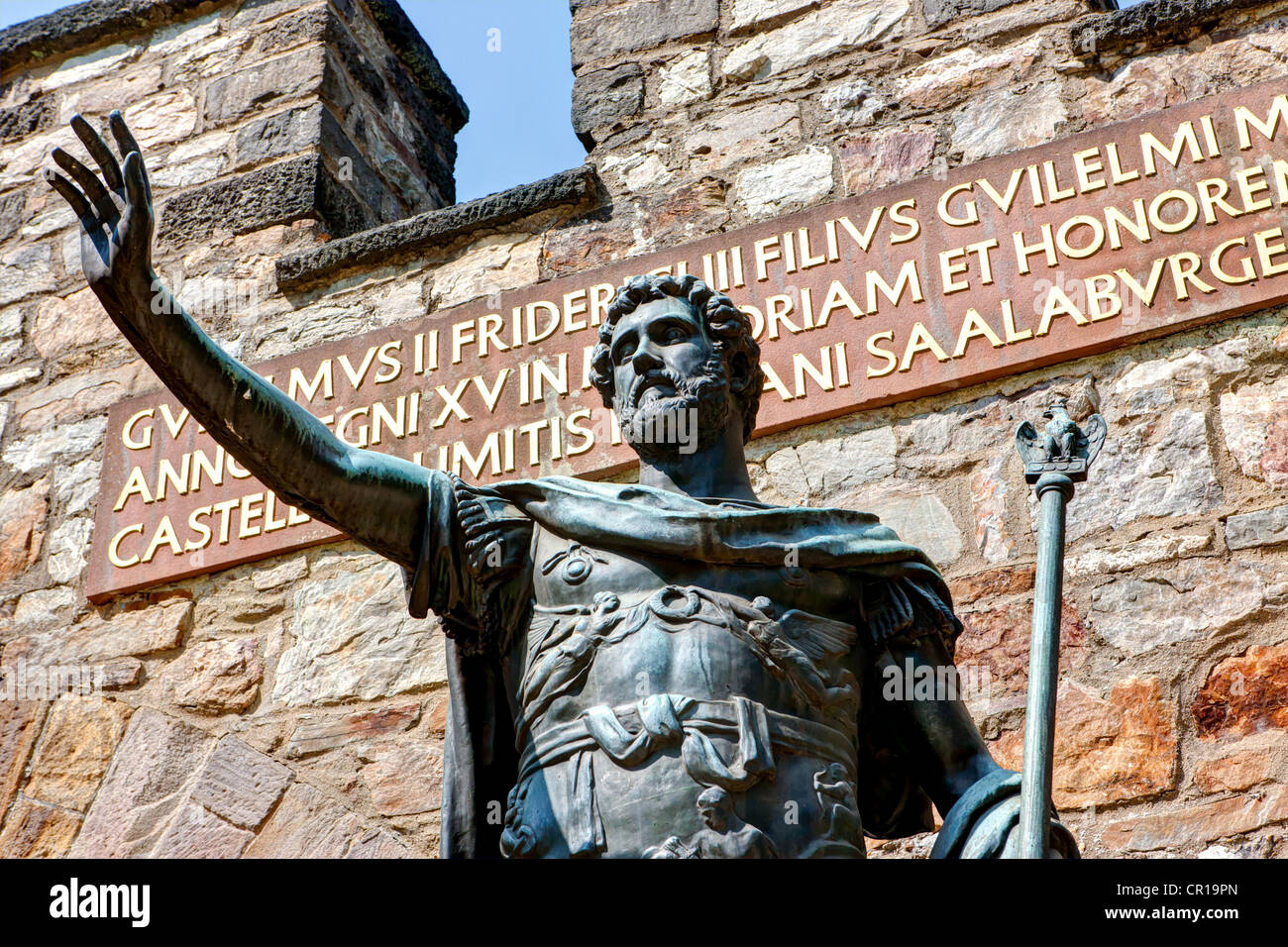 Bronze statue of the Roman emperor Augustus at the entrance of the reconstructed Saalburg Roman fort, Limes Stock Photo