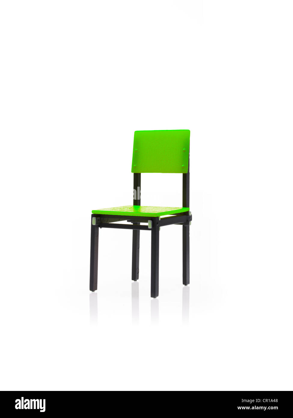 Studio shot of single green chair Stock Photo