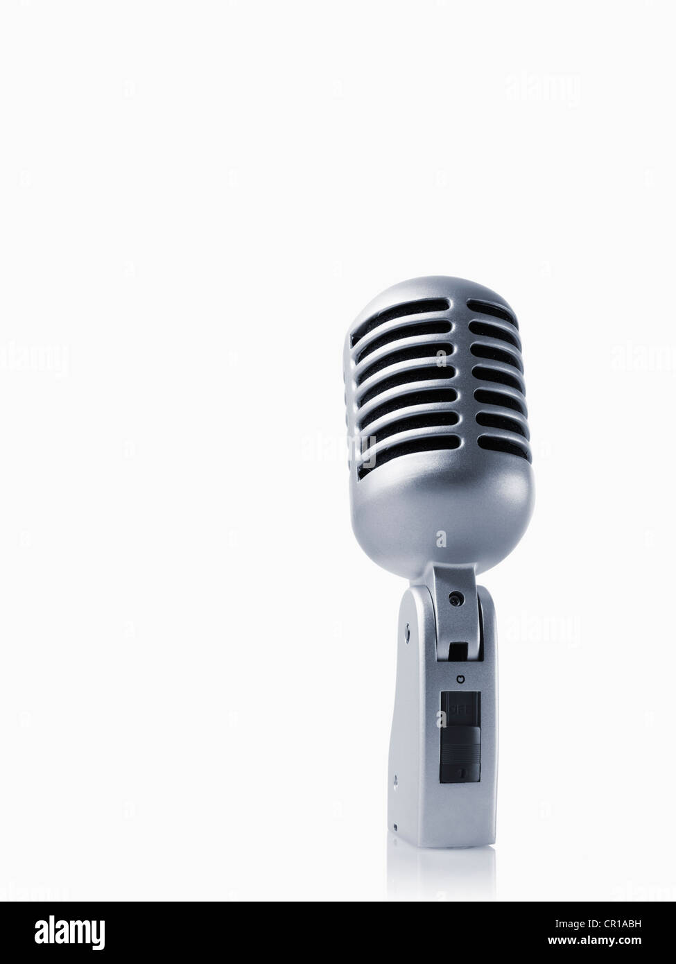 Studio shot of vintage-themed modern microphone on white background Stock Photo