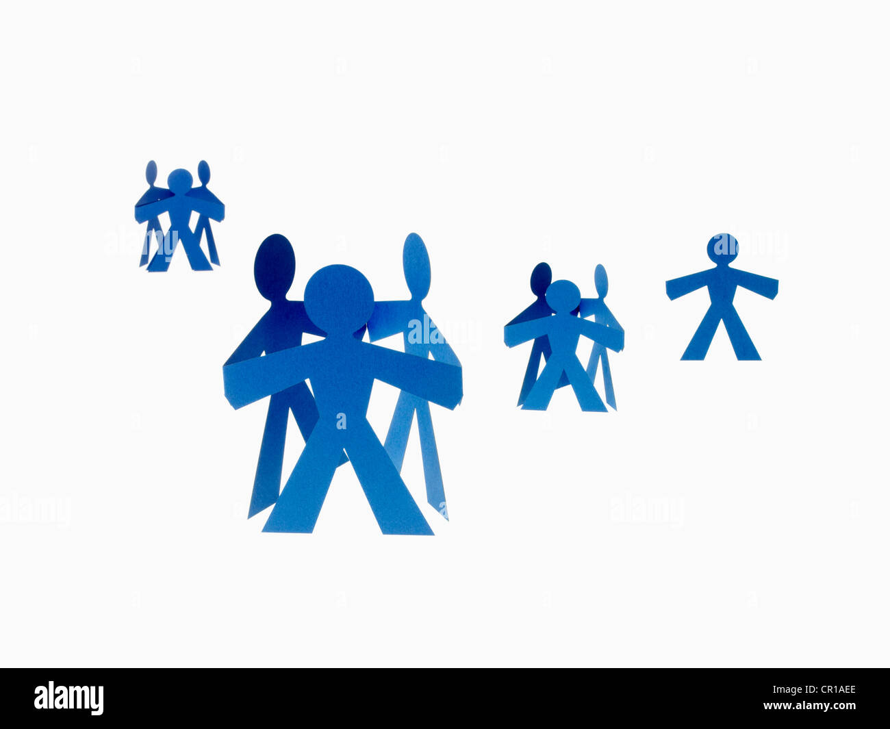 Studio shot of people paper chain Stock Photo - Alamy