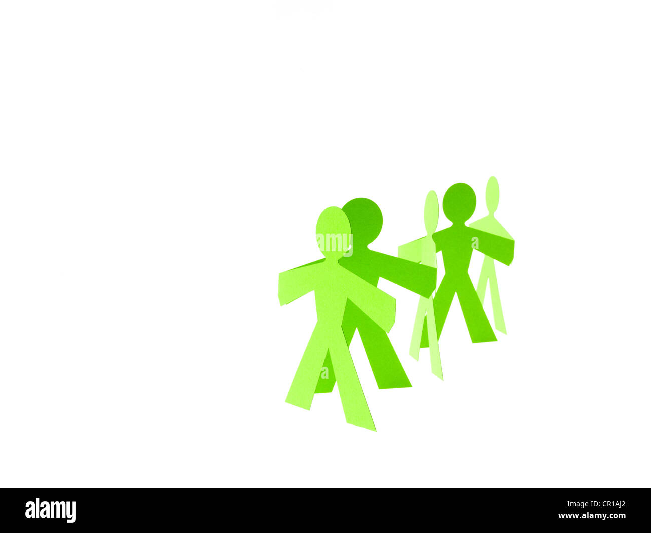 Studio shot of people paper chain Stock Photo - Alamy