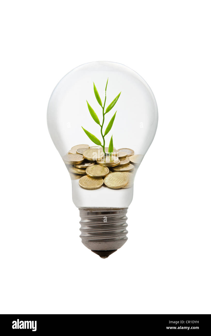 Light bulb filled with coins and a growing plant, symbolic image Stock Photo