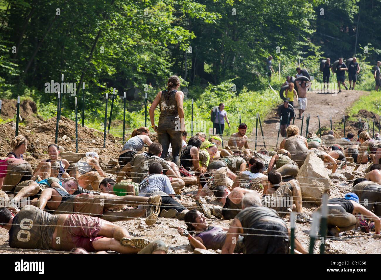 Participants of challenging sprint obstacle trail race, Spartan Race in Tuxedo New York, running