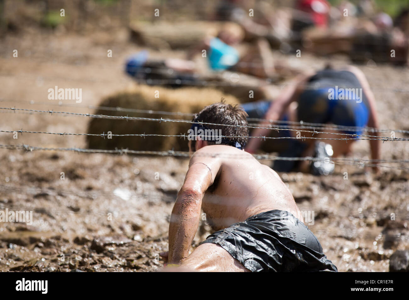 Participants of challenging sprint obstacle trail race, Spartan Race in Tuxedo New York, running