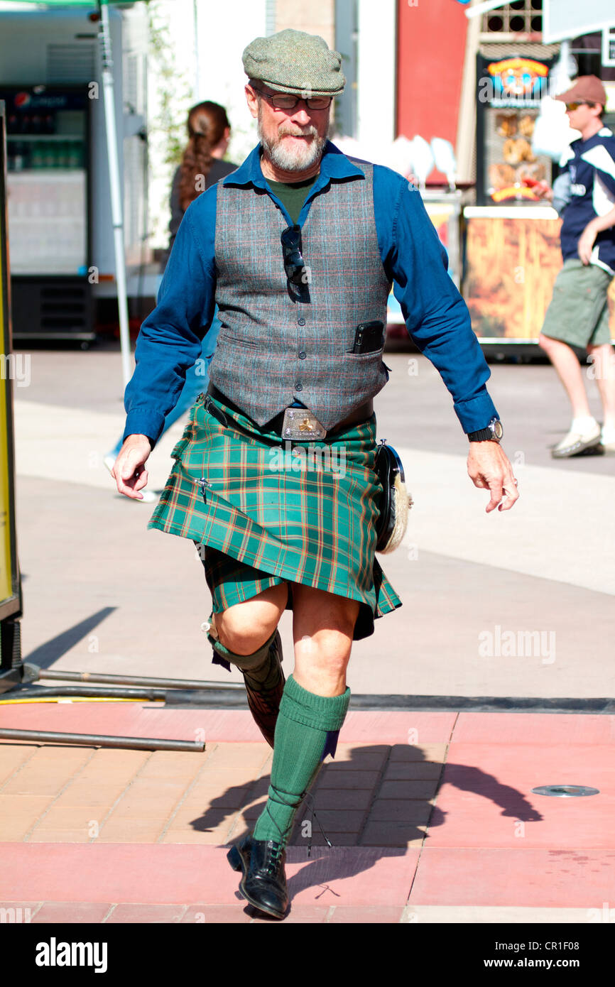 Street performer doing an Irish jig at the Scottish Festival Orange County Fairgrounds Costa Mesa, California. USA Stock Photo