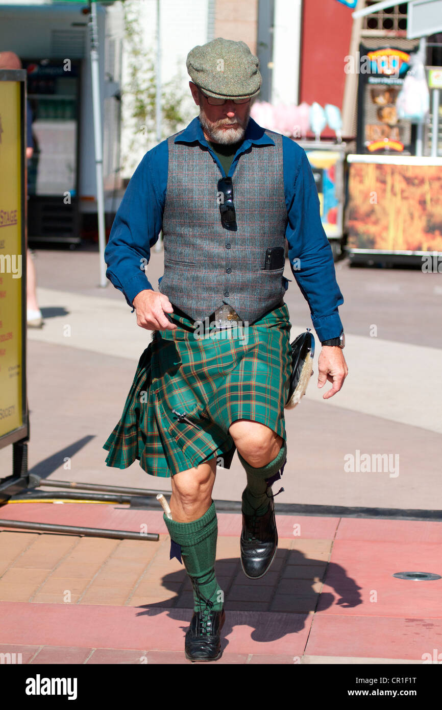 Street performer doing an Irish jig at the Scottish Festival Orange County Fairgrounds Costa Mesa, California. USA Stock Photo