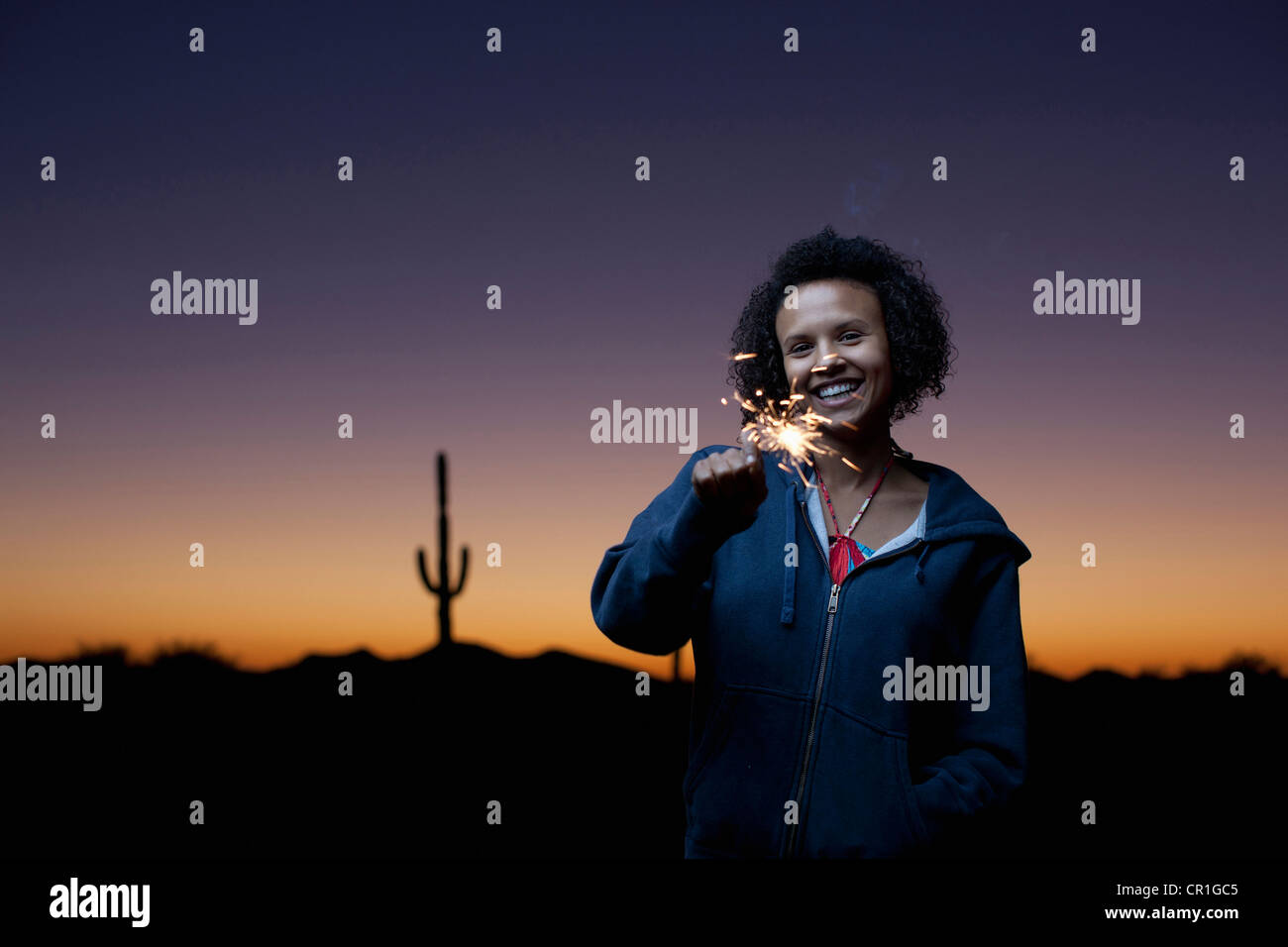 Woman waving in desert hi-res stock photography and images - Alamy