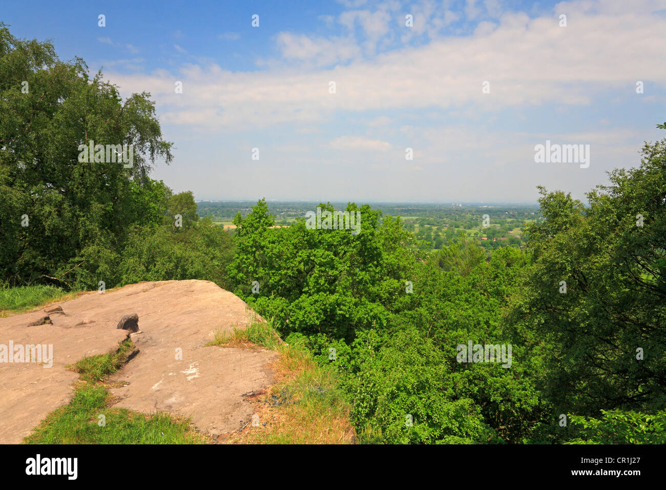 Looking across the Cheshire Plain from Castle Rock on Alderley Edge, Cheshire, England, UK. Stock Photo