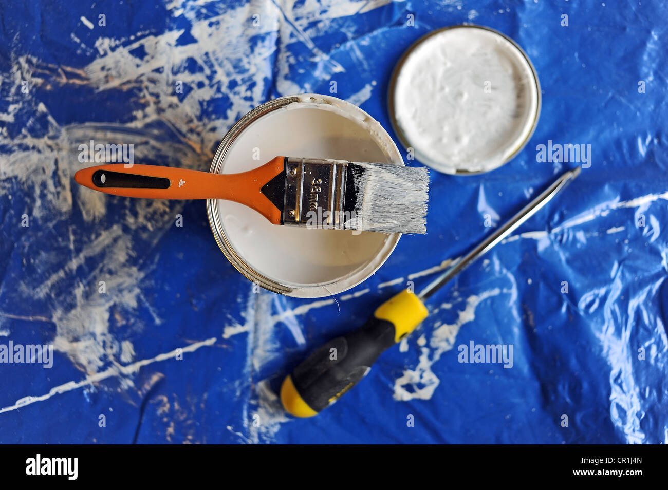 DIY at home paint pot with paint brush and screwdriver Stock Photo Alamy