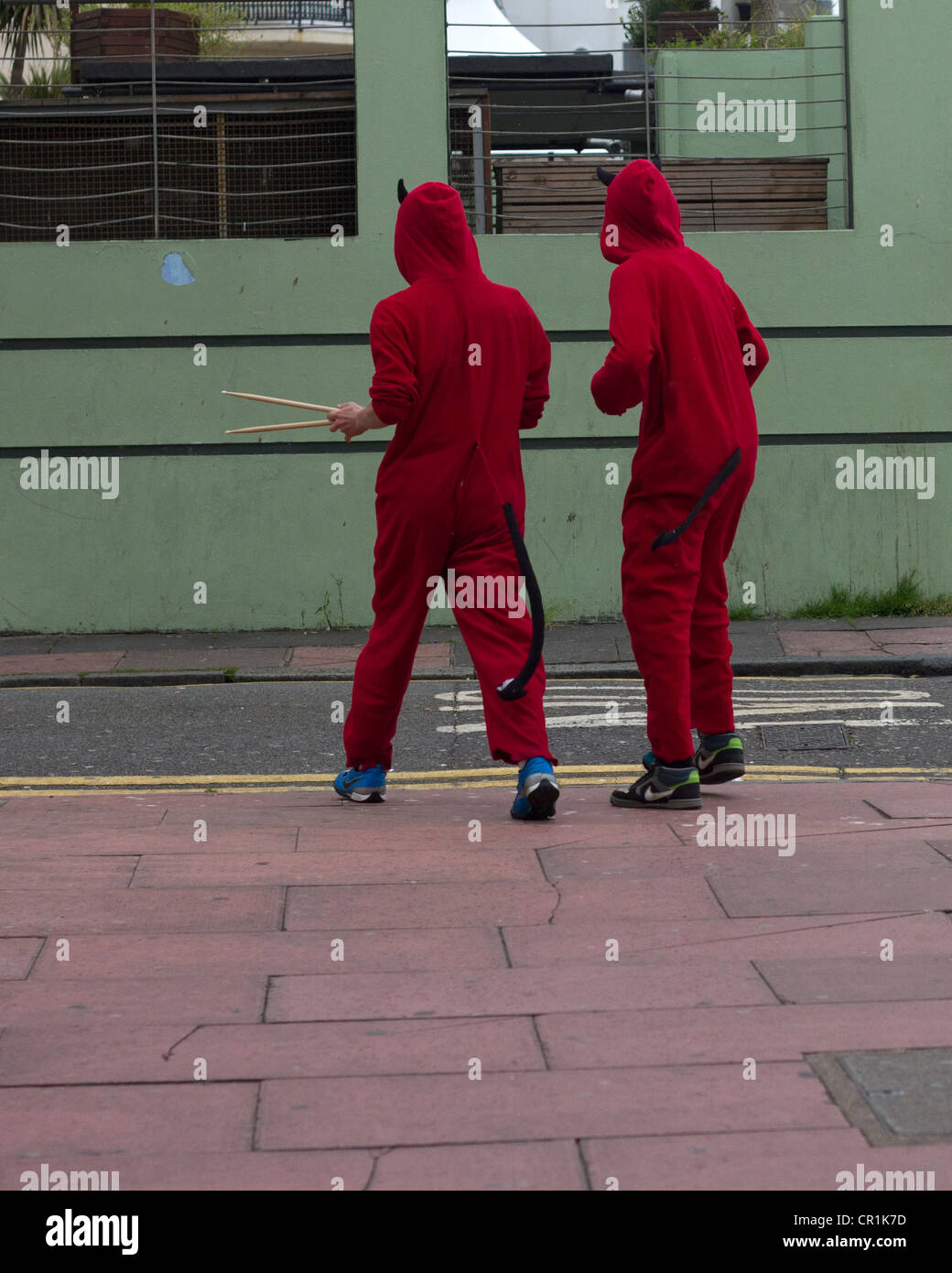 Devils out on the town in Brighton. Stock Photo